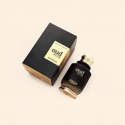 Oud Sera Khadlaj Oud Noir perfume bottle and black box packaging on a light background