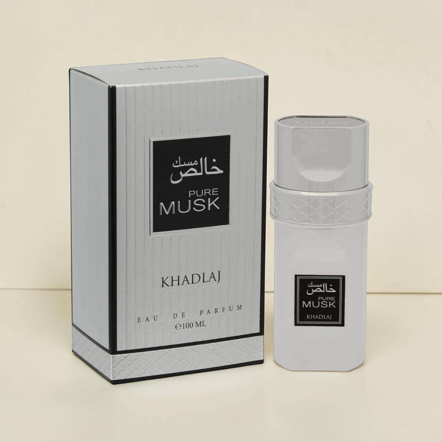 Oud Sera Khadlaj Pure Musk eau de parfum 100ml bottle and silver-grey box with elegant minimalist design