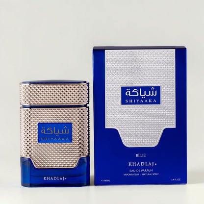 Oud Sera Khadlaj Shiyaaka Blue eau de parfum for men in a blue and silver textured bottle with matching box