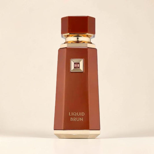 Oud Sera French Avenue Liquid Brun unisex Eau de Parfum in a sleek brown bottle with gold accents.